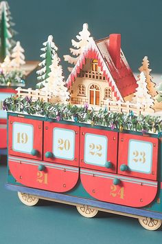 a toy train with christmas decorations on it