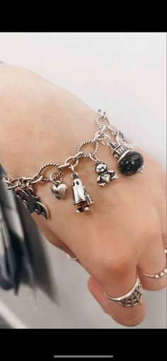 This is my James Avery charm bracelet. 1. Bat charm 2. Keepsake heart charm with citrine 3. Enamel trick or treater charm 4. Teddy bear charm 5. Haunted house art glass charm 6. Adorned starry night charm Shop James Avery through my link with dillards. #dillardsstylepartner James Avery Charms For Bracelets, Charms For Bracelets James Avery, James Avery Texas Charm, James Avery Fishermen Charm, James Avery Dog Charm, James Avery Charm Bracelet, James Avery Charms, James Avery, Trick Or Treater