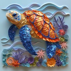 a paper sculpture of a sea turtle surrounded by flowers