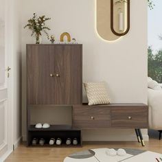 a living room with a white couch and wooden cabinet next to a mirror on the wall