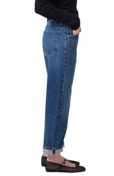 Meant to be worn low on the waist, these slouchy, vintage-inspired nonstretch jeans flaunt bow legs that taper to the ankles and end in uneven cuffs. 25 1/2" inseam; 16 1/2" leg opening; 11 1/2" front rise Button fly Five-pocket style 100% regenerative cotton Machine wash, tumble dry Made in Turkey Fall Tapered Jeans, Medium Wash Tapered Cropped Leg Bottoms, Medium Wash Tapered Cropped Bottoms, Classic High Rise Bottoms With Five Pockets, Fall Medium Wash Tapered Bottoms, Tapered Medium Wash Bottoms With Cropped Legs, Tapered Medium Wash Cropped Bottoms, Classic Medium Wash Bottoms With Belt Loops, Classic Relaxed Fit Cropped Jeans With Tapered Leg