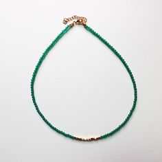 Introducing the Mayan Green Agate and Golden Nugget Necklace, a delicate piece that celebrates the ancient Mayan civilization and showcases the natural beauty of green agate.    • G enuine Green Agate Stones: The mesmerizing green agate stones bring a sense of harmony and healing.They are believed to enhance inner peace and connection with nature.       •   Dainty  Golden Nuggets: The inclusion of golden nuggets adds a touch of splendor and symbolizes prosperity, abundance, and divine energy, sh Jade Crystal Necklace With Polished Beads For Gift, Jade Gemstone Beaded Necklace As Gift, Jade Gemstone Beaded Necklace For Gift, Adjustable Green Beaded Necklaces For Meditation, Minimalist Green Necklaces With Natural Stones, Green Aventurine Round Beaded Necklaces, Green Aventurine Beaded Necklace With Polished Beads, Green Aventurine Round Beaded Necklace, Green Aventurine Beaded Necklaces