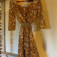 This Was My Senior Homecoming Dress And It Is Beautiful!!! It Was Pretty Expensive And I Only Wore It The One Time To The Dance. Open Back! No Flaws Size 4 Comment Any Questions. Gold Sequin Midi Dress For Formal Occasions, Formal Gold Sequin Midi Dress, Festive Gold Midi Dress For Evening, Gold Knee-length Party Dress, Gold Cocktail Dress For Holidays, Gold Festive Evening Dress, Gold Sequined Midi Dress For Cocktail Events, Gold Sequined Midi Dress For Cocktail, Gold Knee-length Dress For Party Season