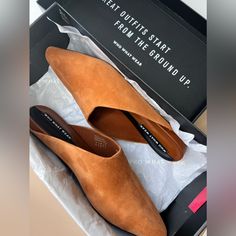 New In Perfect Condition With Box Size 7.5 Chic Brown Suede Mules, Brown Flat Heel Mules For Office, Formal Brown Suede Mules, Brown Almond Toe Mules For Office, Modern Brown Mules With Almond Toe, Brown Suede Flat Mules, Classic Brown Mules For Everyday Wear, Trendy Brown Suede Mules, Classic Brown Mules For Everyday