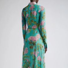 Elevate your evening ensemble with this Robe geranium-print silk chiffon maxi dress. Crafted from luxurious materials, this tenue-de-soiree is designed with long sleeves and ruffles for a look that is both elegant and timelessly sophisticated. Slip it on for a graceful evening look with a hint of glamour. Feminine Long Sleeve Georgette Dress, Green Silk Long Sleeve Midi Dress, Spring Long Sleeve Silk Midi Dress, Long Sleeve Silk Midi Dress For Spring, Silk Long Sleeve Midi Dress For Spring, Chic Long Sleeve Georgette Maxi Dress, Green Long Sleeve Georgette Maxi Dress, Green Georgette Maxi Dress With Long Sleeves, Feminine Long Sleeve Silk Chiffon Dress