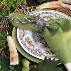 elk napkin ring with cloth napkin at rustic lodge tablescape with deer antler and stag horn accessories Rustic Lodge Decor, Rustic Napkin Rings, Elk Head, Rustic Napkins, Luxury Tableware, Lodge Style, Entertaining Essentials, Lodge Decor, Rustic Lodge