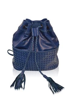 "This backpack is made to order from high quality leather. Ocean Alley convertible is the new staple you'll want to add to your wardrobe and just make everyone swoon when you step out with it. We created ornate woven details on the exterior and added leather stitch accents along the edges and on the straps to give this backpack a rich sophisticated look. Wear it as a backpack, crossbody or as a shoulder bag. Sunup to sundown styling just has never been simpler with our unique and stylish Ocean A Luxury Handwoven Bucket Bag For Travel, Woven Leather Bucket Bag For On-the-go, Woven Leather Bucket Bag For Daily Use, Woven Leather Shoulder Bucket Bag For Travel, Travel Shoulder Bucket Bag In Woven Leather, On-the-go Woven Leather Bucket Bag, Travel Woven Leather Shoulder Bucket Bag, Versatile Leather Bucket Bag With Braided Handles, Leather Bucket Bag With Intrecciato Weave For On-the-go