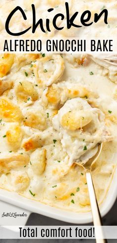 chicken alfredo gnocchi bake in a white casserole dish with a spoon