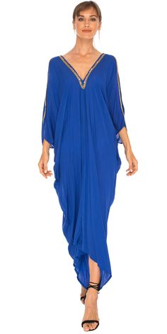 Feeling sexy has never been so easy. Simply toss on this long kaftan dress and wear out for many occasions. Don't forget to pack it on your next beach vacation. It is lightweight with cold shoulder sleeves. Delicate hand sewed gold beading along the deep V neckline. Get your flirt on! Semi-sheer Hand Sewed gold beading Made from lightweight rayon Hand wash cold, hang to dry Long Summer Party Kaftan, Embellished V-neck Maxi Dress For Beach, Long Summer Evening Kaftan, Embellished Long Kaftan For Summer, Embellished Beach Dress For Summer, Embellished Long Kaftan For Spring, Embellished Beach Dresses For Summer, Embellished Floor-length Summer Kaftan, Resort Maxi Length Kaftan