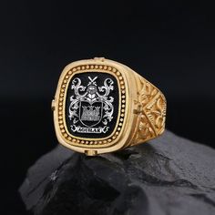 Personalized Signet Ring, Customized Ring, Coat of Arms Ring, Raised Family Celtic Ring, Crest Ring Gift, Gold Coated Family Crest Ring Gift Product Details: ✅Material: 925 Sterling Silver, Gold Coating,  Black Rhodium Coating ✅Ring Size: Available in various sizes (please refer to our sizing chart) ✅Handmade with exceptional craftsmanship ✋🎨 ✅ Dimensions:  21mm   /   ±17gr 🛡️ Discover our custom coat of arms jewelry, a symbol of heritage made uniquely yours! 🌟💍 Choose your family crest and let us bring it to life with expert craftsmanship. 🖌️✨ Our artisans create stunning pieces in silver, gold coating, or rhodium coating, tailored to your preferences. 💫🔒 With attention to detail and a touch of elegance, our jewelry collection includes signet rings, pendants, and bracelets, each de Luxury White Gold Enamel Oval Ring, Luxury 14k Gold Gia Certified Rings, Luxury Gold Enamel Ring For Formal Occasions, Luxury Polished Cluster Ring For Formal Occasions, Luxury Cluster Ring With Polished Finish For Formal Occasions, Luxury Polished Finish Cluster Ring For Formal Occasions, Luxury Polished Open Enamel Ring, Luxury Ceremonial Engraved Ring With Polished Finish, Classic Gold Gia Certified Signet Ring