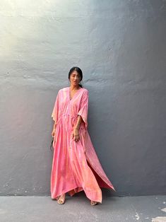 "Sanur" Kaftan  Rayon Fabric. Perfect for Elegant Day and Nightwear or worn as a cover-up for that beach or poolside statement of glamour. And for Muslim women Bali Hand  Tie-dyed Pink   &  Orange  multi motif Measurements in CM and Inches.  American measurement  Medium to Large.  It fits all the body sizes between M to2X Size - One size fits all American size From M to 2XL Total wide /220cm/86inch(round) Chest & him /180cm/70inch(round) The length /140cm/55inch Please see the professional model Lounge Wear Summer, Arab Style, Professional Model, Hand Tie, Mode Boho, Arab Fashion, Kaftan Dress, Style Boho, Muslim Women