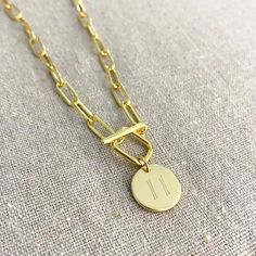 Heatherly Designs basic everyday layering necklace featuring a chunky popular paperclip chain. The necklace closes in the front with a unique toggle clasp in a square shape with a coin charm with your initial of choice. Made from jeweler's brass plated in 14k gold. ●Nickel free ●Padlock initial necklace is sold separately here: https://www.etsy.com/listing/877080160 ●Arrives in our signature Heatherly gift box. Handmade with ❤ by Heather ● ● ● ● ● ● ● ● ● ● ● ● ● ● ● ● ● ● ● ● ● ● ● ● ● ● ● ● →Q Personalized Link Chain Necklace For Everyday, Everyday Personalized Link Chain Necklace, Minimalist Paperclip Chain Necklace With Toggle Clasp, Everyday Toggle Necklace With Paperclip Chain, Everyday Toggle Necklace With Oval Link Paperclip Chain, Everyday Paperclip Chain Necklace With Toggle Clasp, Gift Paperclip Chain Toggle Necklace, Everyday Minimalist Toggle Necklace With Rectangular Links, Minimalist Paperclip Toggle Necklace With Lobster Clasp