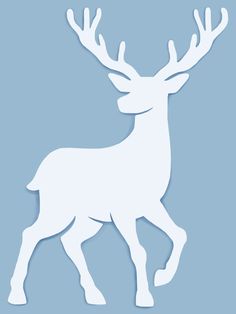 a paper cut out of a deer on a blue background