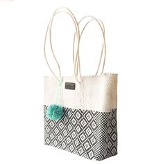 Handwoven by artisans in Mexico using 100% recycled plastic our totes are the perfect go-to for all occasions. Take your bag from the gym, to work, to a beach day, and a stroll around town while carrying all your essentials in this lightweight stylish tote. Crafted from ethically sourced high-quality materials this bag is durable, flexible, and waterproof, made to last for years. Our detachable nylon pouch protects your valuables and keep your things organized and out of sight if needed. Include White Tote Bag, Woven Tote Bag, Everyday Tote, White Tote, Wedding Bag, Waterproof Bags, Wholesale Bags, Gorgeous Bags, Woven Bag