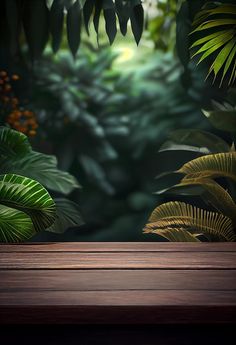 an empty wooden table in front of a jungle scene with lots of green plants and leaves