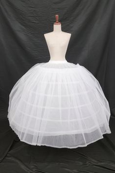 Petticoat with 6 hoops and two mesh outer layers. Comes in two options: 8806: lace up waist with no elastic. 8806E: lace up waist with elastic and hook and eye closure. One size fits all. Pictured with one of our quinceanera dresses: style CHF3066. Tulle Ball Gown With Attached Cancan For Debutante Ball, Fitted White Quinceanera Dress, Fitted Ball Gown With Attached Cancan For Quinceanera, Fitted Quinceanera Dress With Tulle Skirt, White Fitted Tulle Quinceanera Dress, Hoop Petticoat, Formal Occasion Dress, Layered Tulle Skirt, Dresses Style