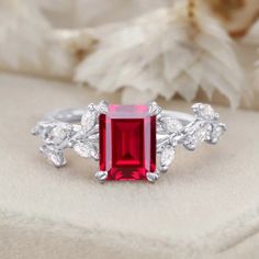 Our 14K Solid Gold Nature-Inspired Emerald Cut Ruby Engagement Ring is a symbol of everlasting love. The natural inspiration behind the design, coupled with the brilliance of the lab-grown ruby, makes this ring truly beautiful. Natural Inspiration, Ruby Engagement Ring, Everlasting Love, Affordable Jewelry, Lab Diamonds, Emerald Cut, Nature Inspired, Precious Metals, Custom Jewelry