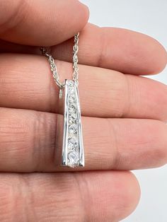 Beautiful urn necklace, 925 sterling silver, a beautiful way to keep the memory of a loved one or beloved pet's ashes/hair. ♥️FreePersonalization:Can be engraved on the back 12 characters maximum. ♥️Gift box included; Funnel kit included; ♥️Care Instructions Even though the materials used are made of sterling silver, I recommend you to not sleep, swim, or spray chemicals (i.e. perfumes, lotions, or body spray) on to the necklace to preserve its longevity. Please follow these tips to preserve the longevity of the necklace. To clean, it is best to use a soft microfiber cloth to clean the jewelry from smudges. ✿ Questions & Concerns ?  Have any questions? Please do not hesitate to send me a message with further questions and concerns. I will be more than happy to assist you! :) Thank you for Silver Diamond Keepsake Jewelry, Silver Diamond Jewelry Keepsake, Silver Hypoallergenic Jewelry For Keepsake, Sterling Silver Channel Set Jewelry As A Gift, Sterling Silver Channel Set Jewelry Gift, Silver Diamond Necklace For Keepsakes, Hypoallergenic Silver Jewelry For Keepsake, Anniversary Sterling Silver Channel Set Jewelry, Silver Channel Set Jewelry As Gift