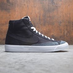 Nike Men Blazer Mid '77 Vintage We (black / black-black-white) Retro Black Mid-top Skate Shoes, Black Retro Mid-top Skate Shoes, Retro Black Skate Shoes For Streetwear, Vintage Leather Skate Shoes With Contrast Sole, Black High-top Sneakers With Gum Sole For Skateboarding, Retro Black Sneakers With Gum Sole, Retro Black High-top Skate Shoes, Classic Black High-top Sneakers, Vintage Leather Skate Shoes