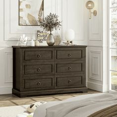 a bedroom scene with focus on the dresser