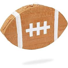 a paper football with white crosses on it