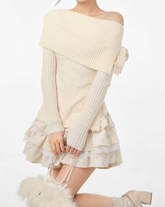 This Balletcore Ribbed Knit Off-Shoulder Sweater has long sleeves and a charming bow detail, making it the perfect addition to your coquette aesthetic outfit Size: • S: Bust: 94cm/ 37.0 in, Length: 53cm/ 20.9 in, Sleeves: 46cm/ 18.1 in• M: Bust: 100cm/ 39.4 in, Length: 54cm/ 21.3 in, Sleeves: 47cm/ 18.5 in• L: Bust: 104cm/ 40.9 in, Length: 55cm/ 21.7 in, Sleeves: 48cm/ 18.9 in• XL: Bust: 108cm/ 42.5 in, Length: 56cm/ 22.0 in, Sleeves: 49cm/ 19.3 inMaterial: Acrylic White Ruffled Skirt, Horror Girl, Bow Sweater, Half Skirt, Ruffled Skirt, Sanya, Off Shoulder Sweater, Shoulder Sweater, Dress Romper