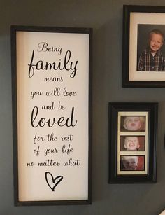 framed family pictures hang on the wall next to a couple's names and photos