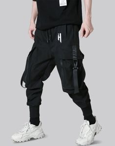 Cyberpunk Joggers Techwear Pants With Side Pockets, Techwear Pants For Outdoor Activities, Functional Streetwear Pants With Side Pockets, Techwear Parachute Pants For Streetwear, Techwear Parachute Pants With Side Pockets, Baggy Techwear Sweatpants For Winter, Baggy Techwear Sweatpants For Outdoor Activities, Functional Streetwear Bottoms With Side Pockets, Functional Parachute Pants For Streetwear