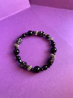 Gothic black skull beaded bracelet.  Stretchy crystal wire.  All of our jewellery is handmade to order. We love every piece that we make and we know you'll love it too! Black Skull, Black Skulls, Beaded Skull, Arm Band, Beaded Bracelet, Beauty Book, Jewelry Bracelets, Accessory Gift, Beaded Bracelets