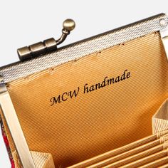 With a nod to the Victorian era, MCW’s freshly combines the classic and elegant design of the traditional carpet bag with a textural and tactile twist.This cute yet functional card wallet is is made with rich chenille carpet fabric, silky lining and kiss lock clasp, it's a perfect addition for your purse, or fits in jean pockets when you are not wanting to carry a bag.Besides credit cards and ID, the card slots can hold business cards or work badge as well, and you can put bills in the 2 deeper Elegant Red Coin Purse With Interior Card Slots, Elegant Square Wallets For Gift, Elegant Square Wallets As Gifts, Elegant Square Wallets For Gifts, Rectangular Coin Purse With Card Slots, Retro Rectangular Wallets For Gifts, Rectangular Red Clutch With Interior Card Slots, Red Rectangular Clutch With Interior Card Slots, Rectangular Clutch With Card Slots