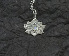 Lotus Necklace  Water Lily Necklace  Silver Lotus by spaceweaver Silver Moonstone Jewelry For Festival, Engraved Teardrop Spiritual Jewelry, Silver Teardrop Necklace For Festivals, Silver Teardrop Necklace For Festival, Festival Silver Teardrop Necklaces, Spiritual Silver Etched Jewelry, Spiritual Soldered Sterling Silver Jewelry, Spiritual Sterling Silver Soldered Jewelry, Silver Moonstone Necklace For Festivals