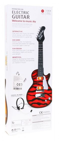 the electronic guitar is red and black with zebra stripes on it's body, as well as instructions for how to play