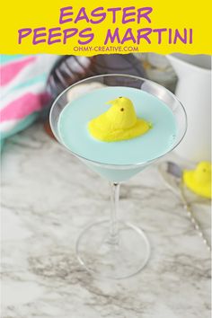 an easter peeps martini in a glass with the text overlay that says,