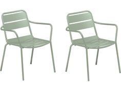 two green chairs sitting next to each other