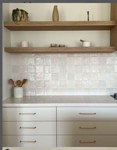 the kitchen counter is clean and ready to be used as a cooktop area for cooking