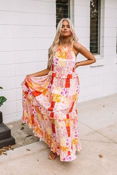 We have no doubt you will love this unique maxi dress featuring lightweight breezy material patterned with a red, coral, peach, mustard, and light pink hued floral patchwork print, a rounded neckline, skinny shoulder straps that tie across the upper back, ruffled accent seams, and a relaxed tiered silhouette that cascades into a straight ankle-length hemline! 
    Measurements S variant has  a Bust of 36",  a Hip of 50",  a Length of 51",  a Waist of 40".  M variant has  a Bust of 38",  a Hip of Sleeveless Maxi Dress With Floral Patchwork For Spring, Bohemian Orange Maxi Dress For Garden Party, Sleeveless Floral Patchwork Maxi Dress For Summer, Pink Patchwork Maxi Dress For Summer, Summer Pink Patchwork Maxi Dress, Multicolor Floral Patchwork Maxi Dress For Vacation, Summer Patchwork Pink Maxi Dress, Flowy Pink Printed Maxi Dress, Summer Floral Patchwork Maxi Dress For The Beach