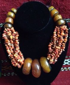 Vintage Berber Moroccan Copal Amber Coral Necklace Huge Unique Brown Jewelry For Ceremonial Occasions, Unique Oval Jewelry For Ceremonial Occasions, Bohemian Brown Ceremonial Jewelry, Traditional Oval Ceremonial Necklaces, Artisan Necklace For Ceremonial Occasions, Traditional Oval Necklaces For Ceremonial Occasions, Traditional Oval Ceremonial Necklace, Vintage Polished Bead Pendant Jewelry, Traditional Formal Necklace With Stones