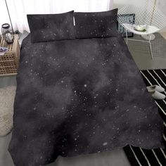 a bed with black and white stars on it