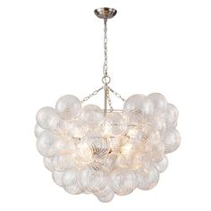 a chandelier with glass balls hanging from it's center point, on a white background