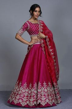 Magenta pink raw silk lehenga with placement floral embroidery and cutwork hemline. Comes with embroidered blouse and organza dupatta.
Components:3
Embroidered
Neckline:Round
Sleeve Length:Half
Fabric:Raw silk, Organza
Color:Pink
Cutwork detail
Note: Cancan worn by the model is not for sale - Aza Fashions Anushree Reddy Lehenga, Raw Silk Lehenga, Lehenga Designs Simple, Anushree Reddy, Gaun Fashion, Green Lehenga, Half Saree Designs, Embroidered Lehenga, Groom Outfit