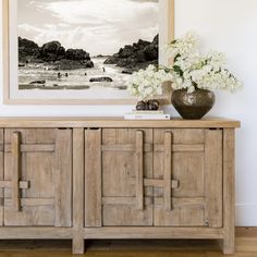 the sideboard has four doors and two drawers