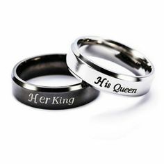 two wedding rings with the words afr king and afr queen engraved on them