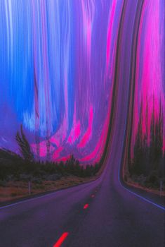 an image of a road that is painted in pink, blue and purple colors with streaks of light coming from it