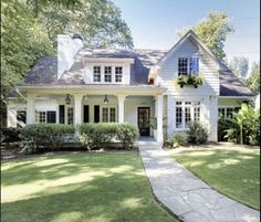 a large white house with lots of windows