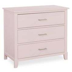 a pink chest of drawers with three drawers