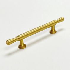 an image of a brass handle on a white background