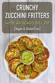 zucchini fritters with avocado dip on a white plate