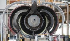 an airplane engine is shown in the process of assembly