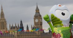 an inflatable character with big ben in the background