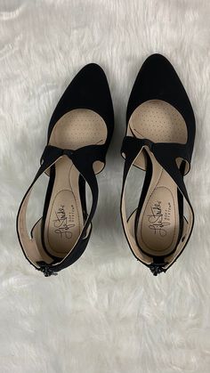 This micro-suede pump comes in black and navy.  This 2 1/2 inch heel is so comfortable and has a back zip closure with side cutouts. Pointed Toe Heels With Zipper Closure, Evening High Heels With Arch Support, Suede Heels With Zipper Closure And Round Toe, Black Pointed Toe Heels With Arch Support, 2 Inch Heels, Suede Pumps, Black And Navy, Pumps, Navy